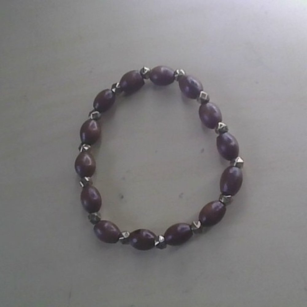 this is a brown and gold bracelets